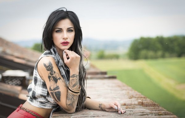 Brunette girl with cat tattoo