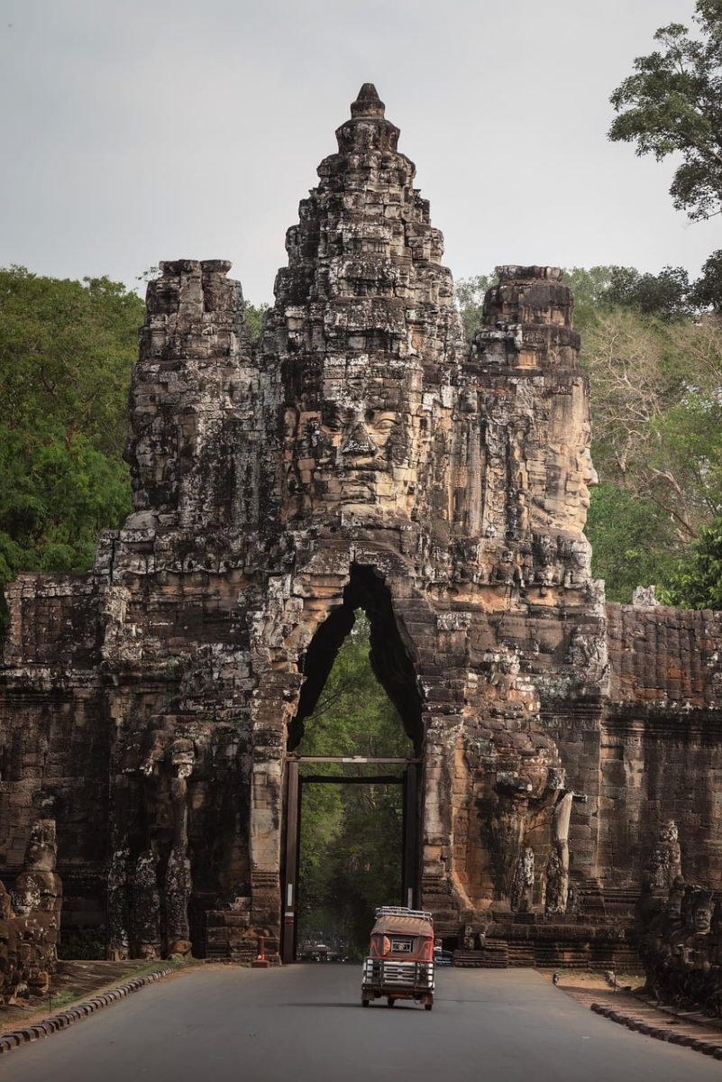 angkor wat, temple, architecture, historic, khmer, culture, travel, landmark, tourism, asian, buddhism, history, road, with vehicle, nature, jungle, trees, asia, famous, proof, cambodia