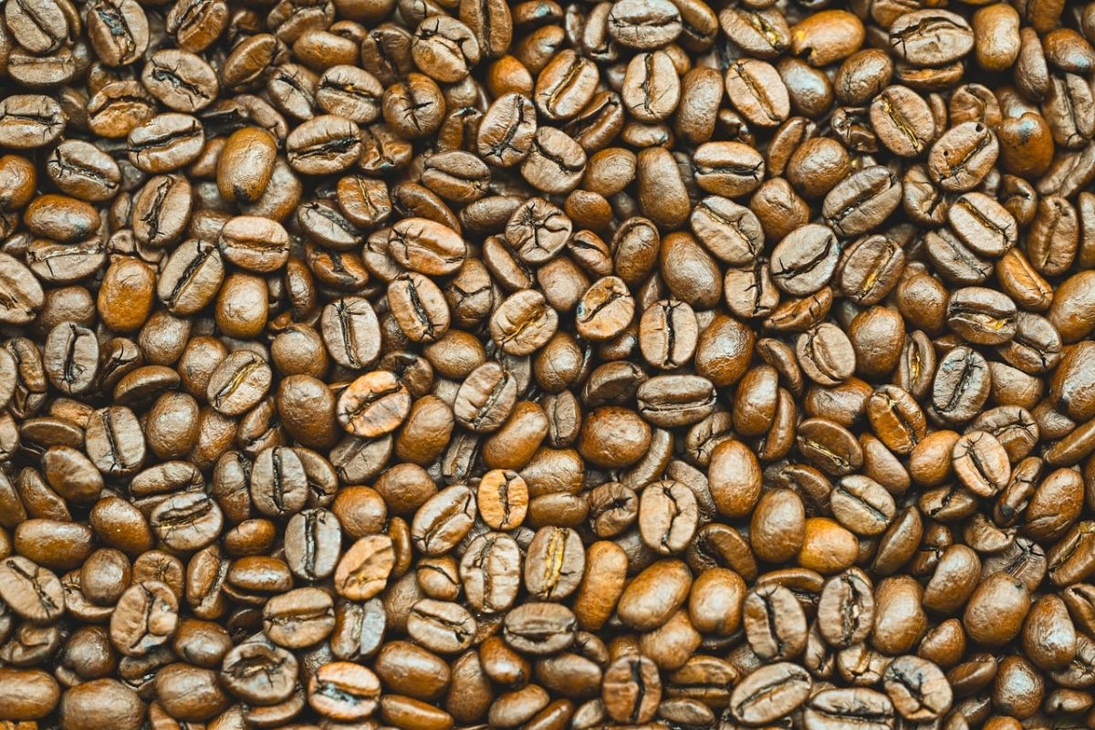 coffee, coffee beans, roasted, texture, brown, coffee aroma, coffee industry, food, coffee blends, organic, alt text close-up of coffee beans, bulk production, energy, close-up, caffeine, warm tone, natural product, coffee trade, harvest