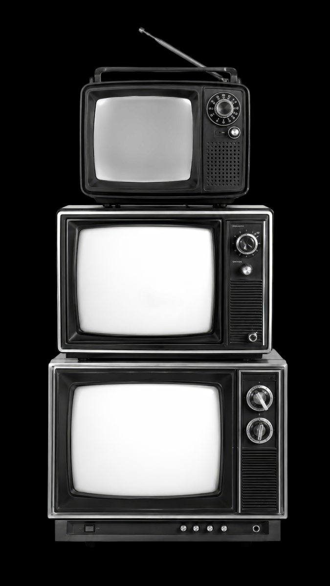 vintage television, retro technology, stacked television, analog television, old electronics, classic television, communication device, nostalgic device, broadcast media, retro design, television history, entertainment technology, isolated object, outdated technology, screen display, antenna television, historical device, television collection, entertainment device, image nostalgia