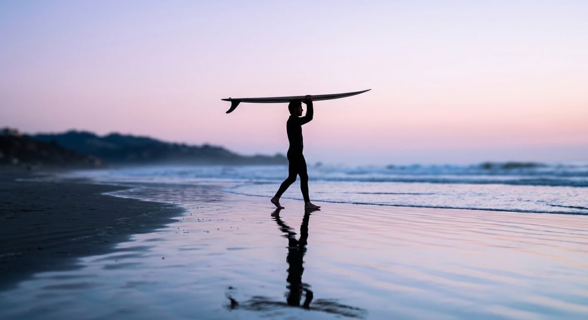 surfer, surfboard, nature, sunrise, silhouette, ocean, water reflection, sunday afternoon, waves, wet sand, coastal scenery, sunset, pink horizon, active lifestyle, recreation, sport, leisure, tranquility, evening, travel