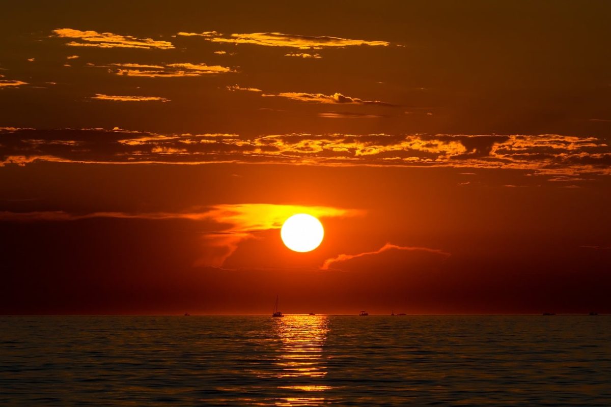 sunset, nature, landscape, sea, horizon, beach, water, seascape, evening, west, red, orange, boat, reflection, stunning, peaceful, sunset on beach, scenic beauty, clouds, golden hour