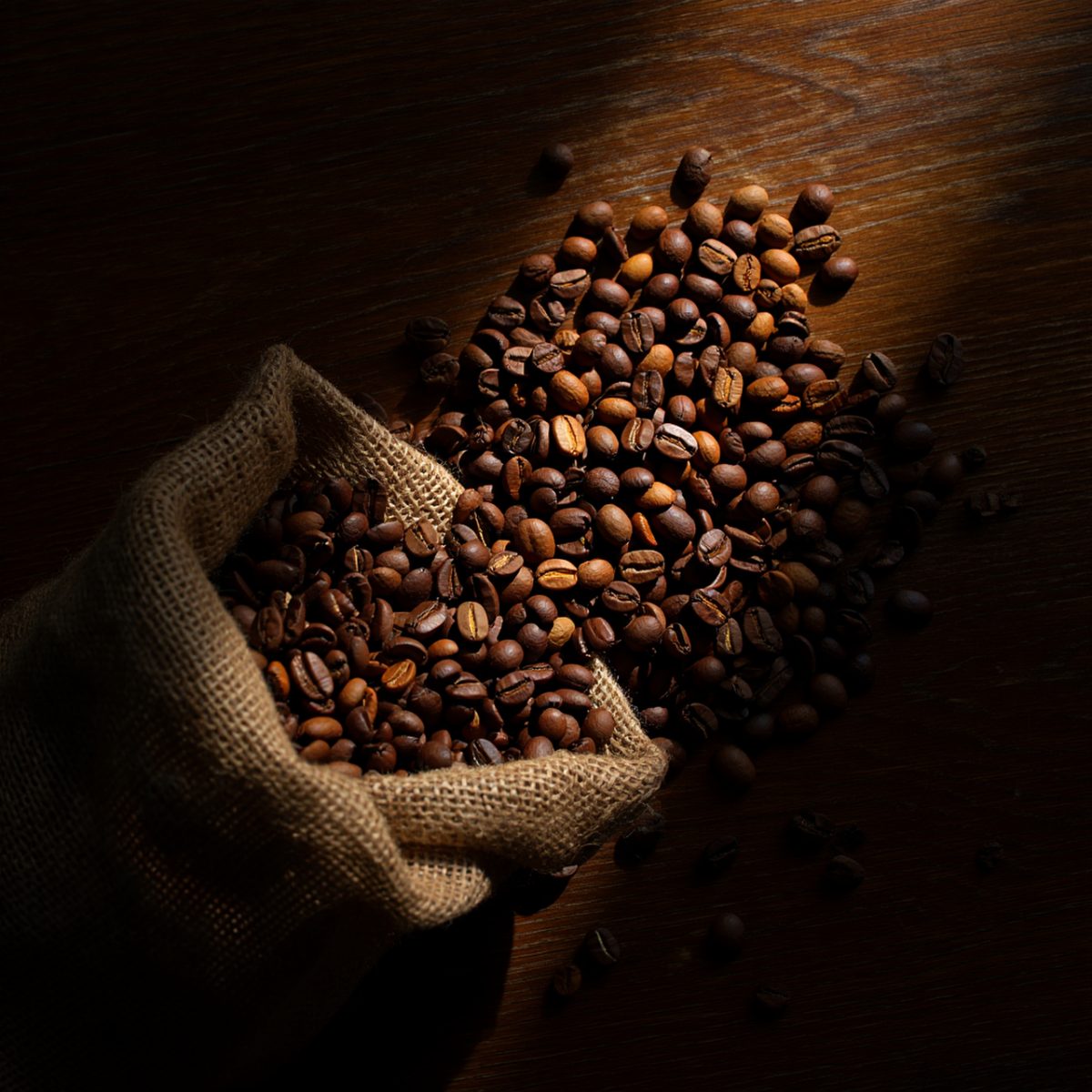 coffee, coffee beans, burlap, sack, texture, wood, shadow, dark background, lighting, traditional, natural, rustic, coffee machine, drink, preparation, aromatic, morning ritual, fresh, calm, delicious, energizing