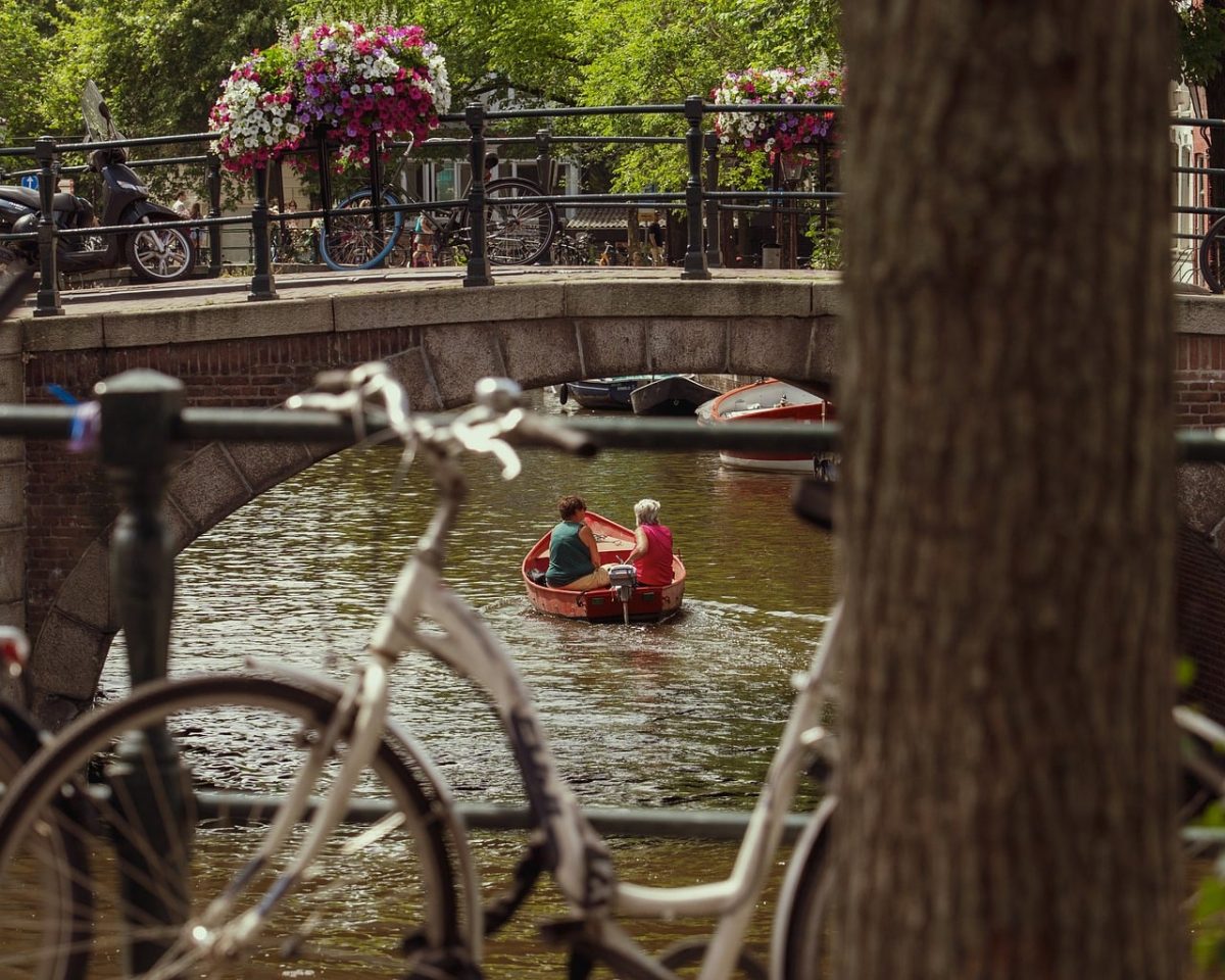 city, canal, architecture, nature, netherlands, water, channel, amsterdam, tourism, river, travel, buildings, europe, boats, holland, houses, historic bridge, bicycle, flower bouquet, lifestyle, picturesque