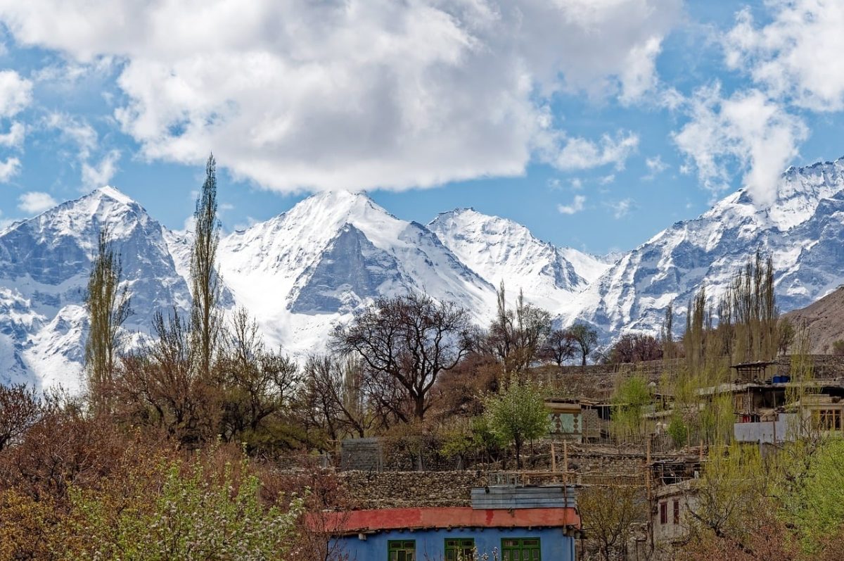 nature, mountains, snow, pakistan, gilgit-baltistan, sky, clouds, village, houses, karakoram, landscape, spring, picturesque, peak, rocky, cliffs, wild, sense of calm, trees