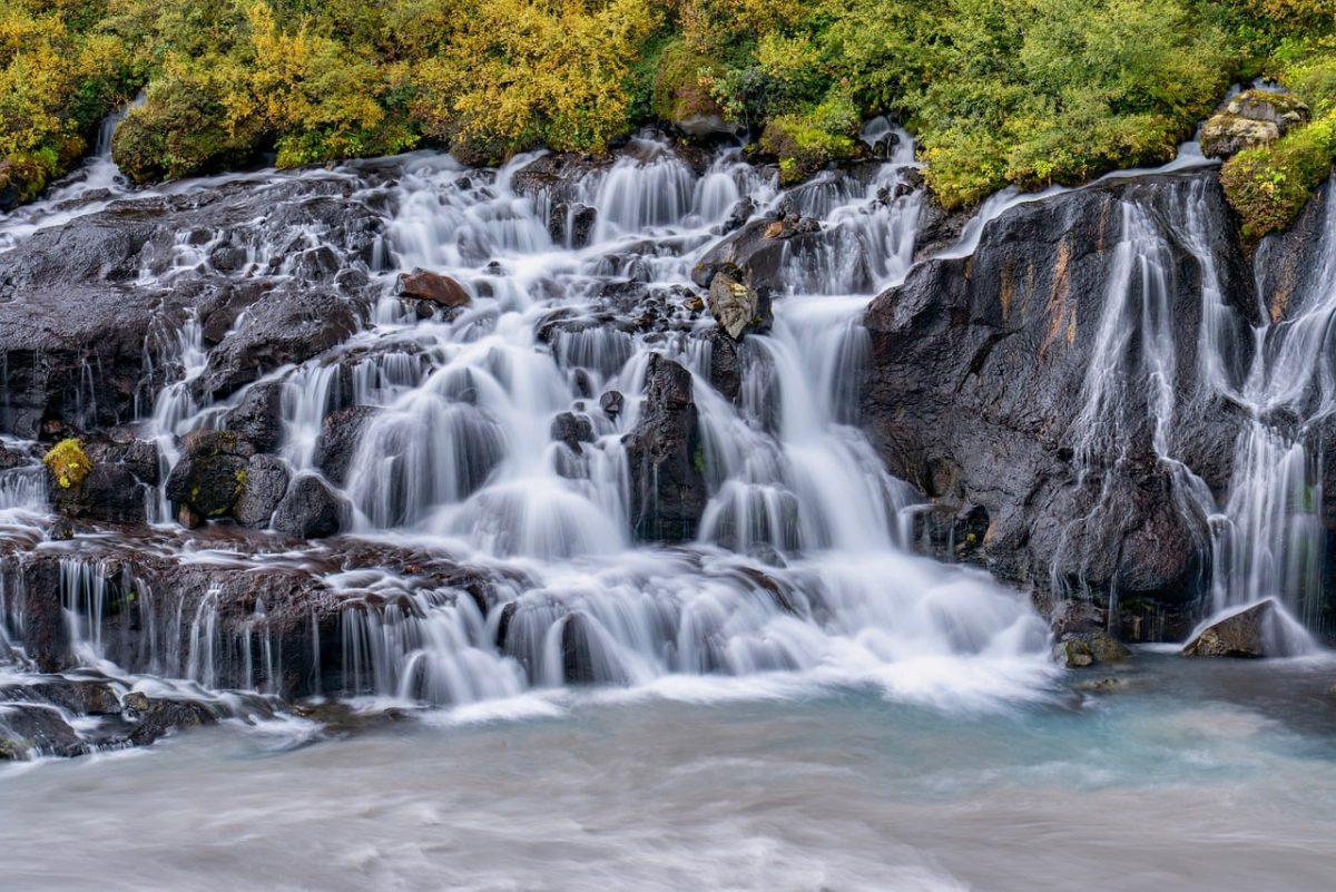 waterfall, river, rock, forest, nature, travel, outdoor, autumn, green, landscape, waterfall veil, cool, rugged terrain, peaceful, hiking, iceland, current, water flow, branches, waterway, september, gentle