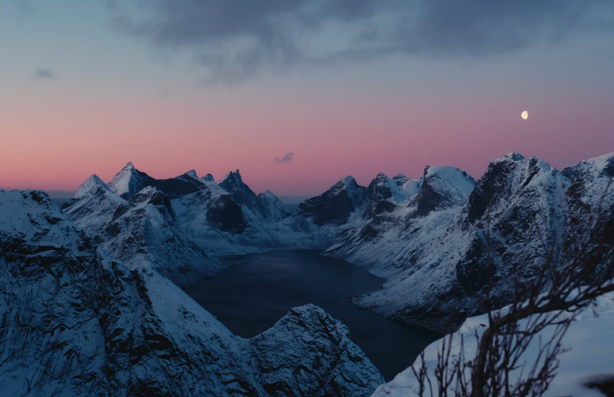 mountains, snow, peaks, fjord, water, twilight, sunset, dusk, moon, crescent moon, night sky, sky, pink sky, purple sky, winter, cold, landscape, scenic, wilderness, panorama, view, nature