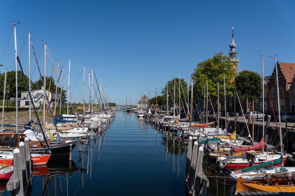 harbor, boats, water, canal, holland, blue sky, city, tourism, architecture, yacht, holiday, sailing, peaceful, bell tower, panorama, spire, greenery, daylight, view