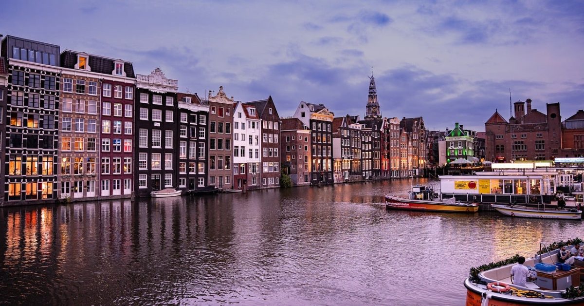 amsterdam, netherlands, canals, architecture, historic buildings, evening, waterfront, boat, reflections, postcard, tourism, city, house, canal architecture, boats, colorful buildings, landscape, scenic environment, tourist attraction