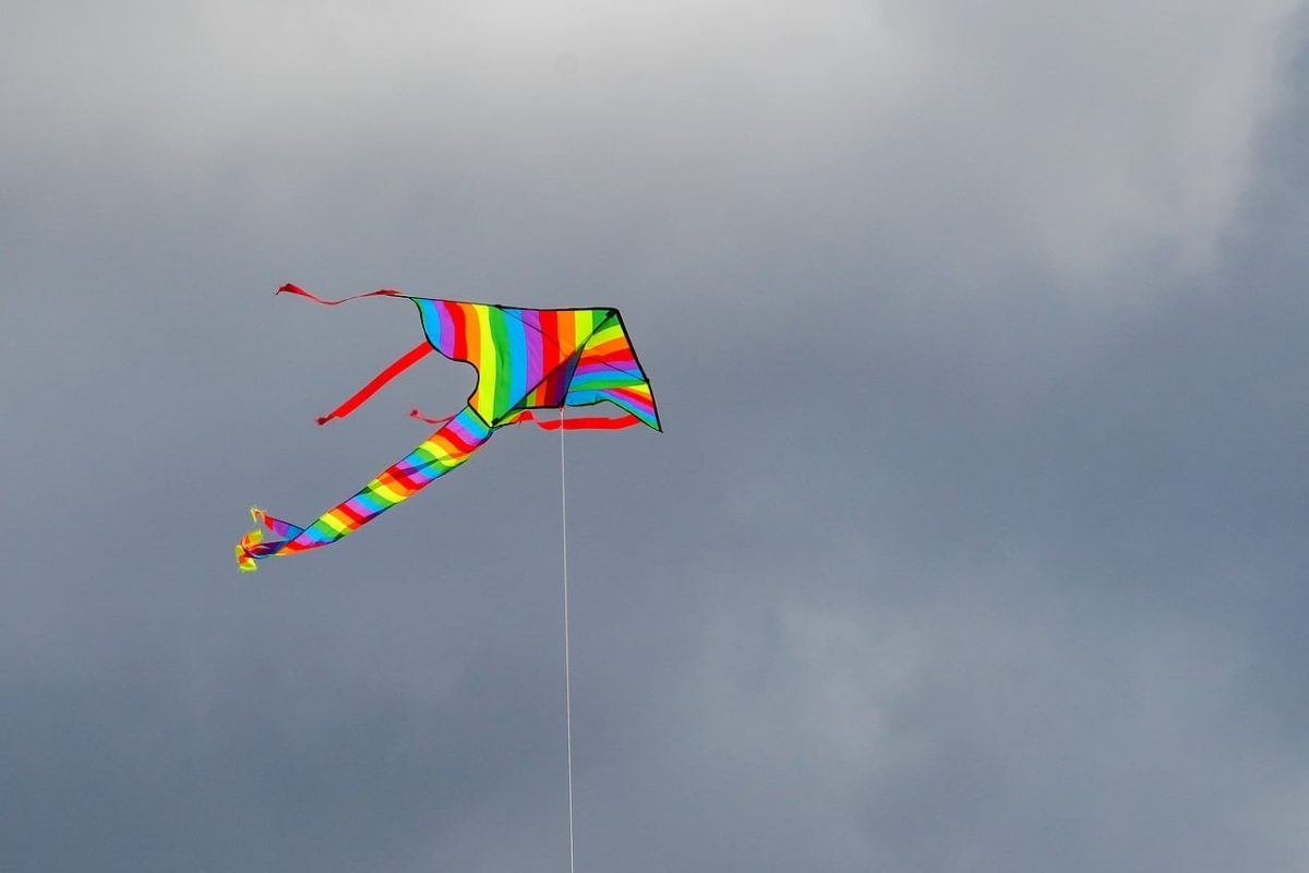 kite, rainbow, flying, wind, sky, summer, leisure, fun, blue, cloud, colorful, playful, tail, outdoor, kite shape, lightweight, freedom, simple, spirit, happy