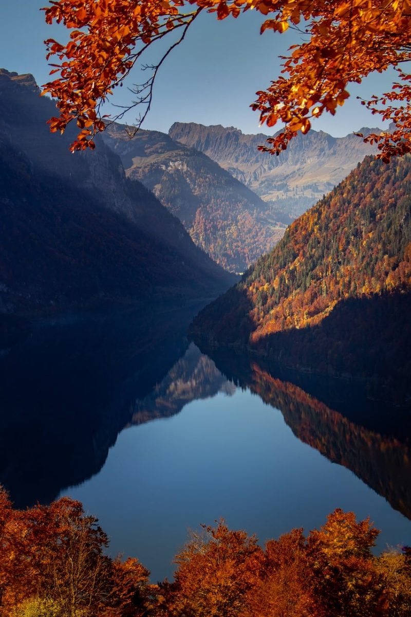 switzerland, klöntalersee, alps, lake, autumn, colors, sunset, reflection, nature, orange, mood, hiking, glarnerland, landscape, photography, calm, tourist destination, idyllic, calm water, mountain landscape, hiking trail