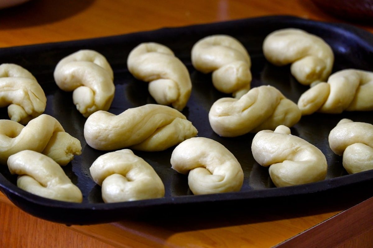 baking, dough, flatbreads, baking tray, bread making, kitchen, homemade, snacks, fermented, soft, unbaked, ingredients, wheat flour, kneading, breakfast, aroma, shaping, freshly baked, favorite, knotting