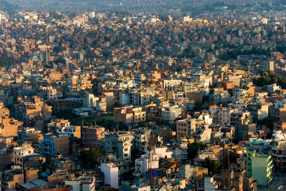 kathmandu, nepal, swayambhunath, urban landscape, sunrise, kathmandu valley, city view, morning light, cityscape, south asia, nature, travel photography, aerial view, dense buildings, capital city, summer season, himalaya foothills, settlement, city panorama