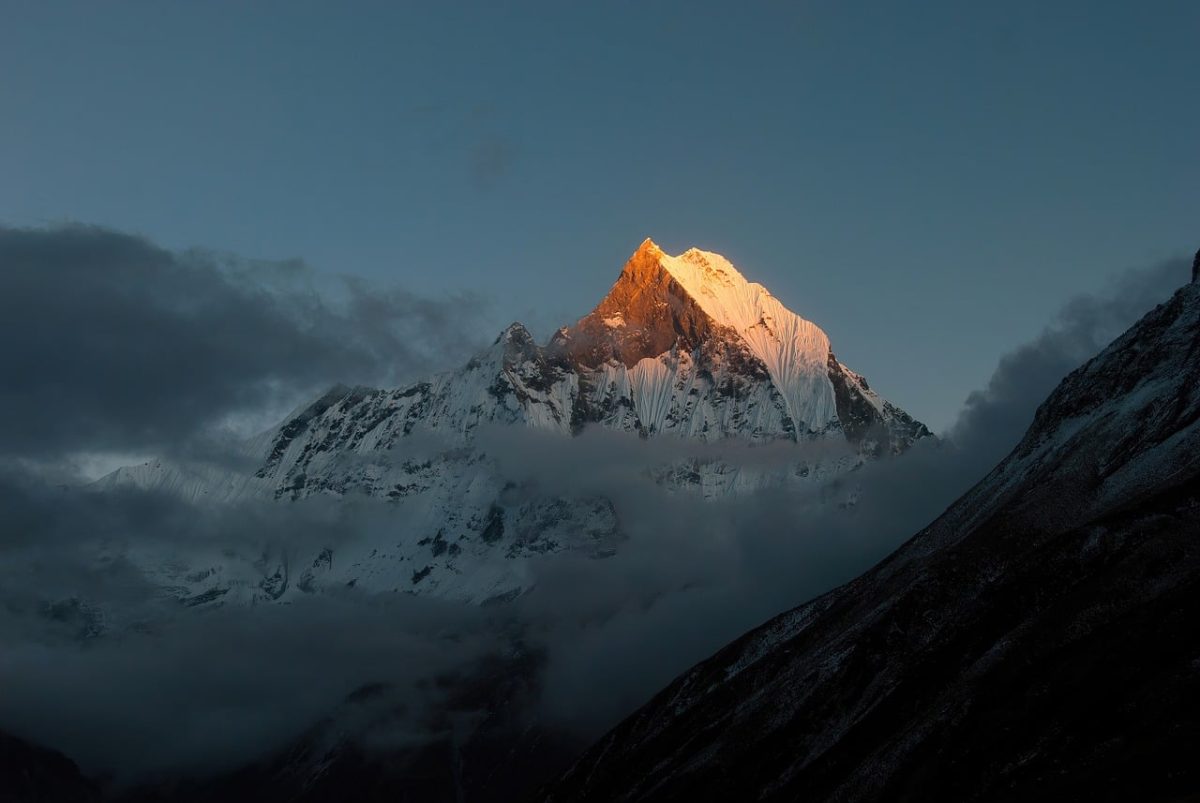 machhapuchhre, fishtail, annapurna base camp, nepal, himalayas, sunset, mountain peak, snow mountain, landscape, nature, trekking, travel, alpine, golden hour, scenery, wilderness, high altitude, steep mountain, clouds, mountaineering, natural beauty
