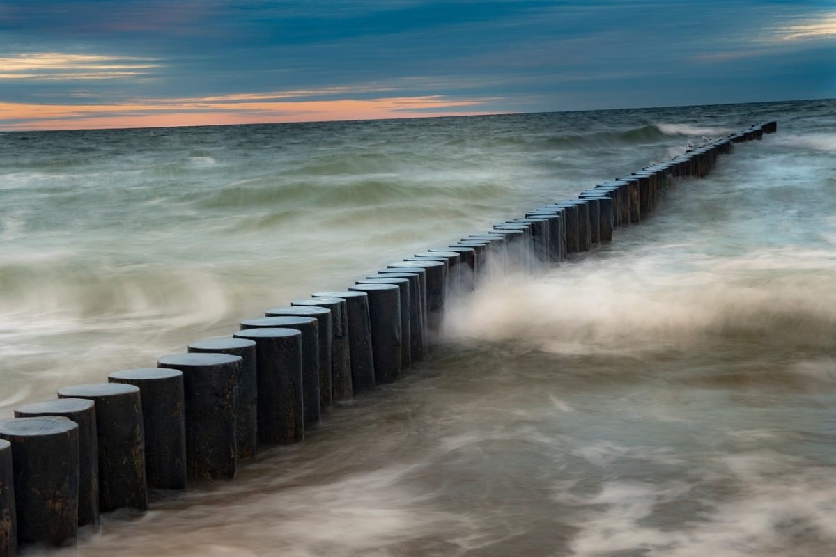 sea, evening, water, waves, nature, horizon, breakwater, sunset, dramatic, clouds, coast, evening sky, rocks, pulsating, long exposure, wood, tide, liquid, wooden pillars