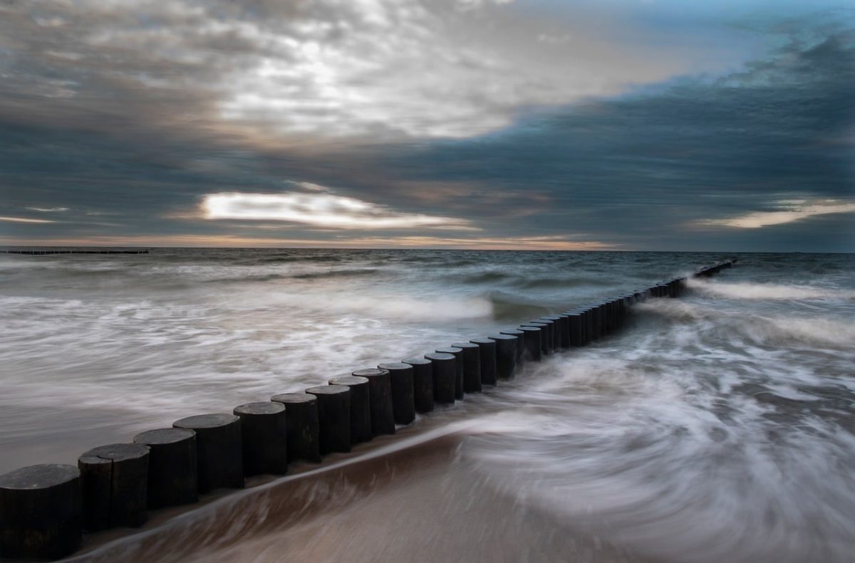 sea, waves, wooden groynes, nature, tide, sky, clouds, cold colors, stormy weather, natural scenery, damp weather, coast, dramatic clouds, north sea, water, sandy beach, breakwater, at sunset, misty atmosphere, water evidence