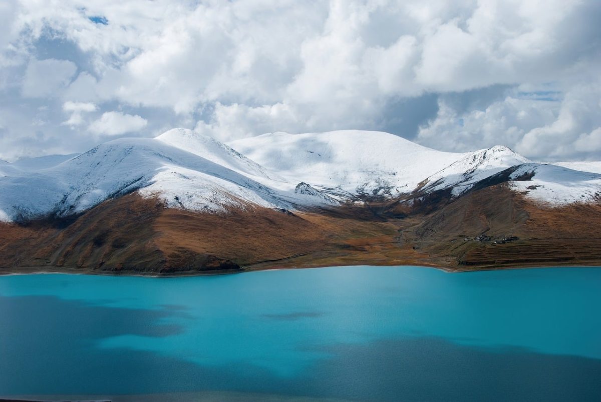 mountains, nature, lake, snow, blue water, sky, panorama, landscape, clouds, winter scene, tranquility, highland landscape, wilderness, natural beauty, hiking, alpine range, nature reserve, peaceful atmosphere, dramatic sky