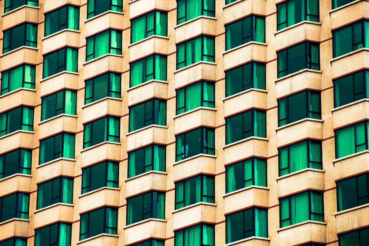 architecture, windows, modern, city, building window, glass panes, urban landscape, geometric pattern, symmetry, grid pattern, yellow, green, concrete structure, high-rise, office building, urban style, architectural design, repetitive pattern, urban architecture