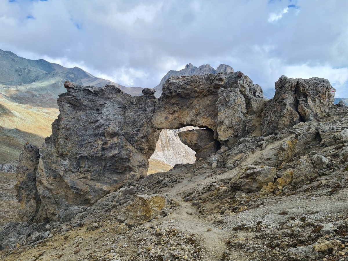 rock, natural bridge, mountains, clouds, sky, hiking, nature, desert, natural formation, geology, pathway, travel, adventure, stones, climate, aridity, rock arch, panorama, monument