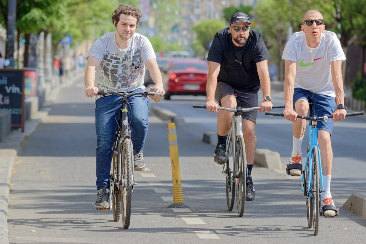 men, bicyclists, running, bike lane, track, street, urban, recreation, sports, transport, ecological, lifestyle