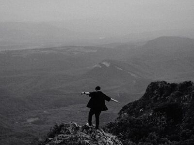 nature, mountains, landscape, black and white, cliff, solitude, adventure, silhouette, standing man, freedom, viewpoint, mist, ascent, hiking, natural beauty, reflection, lonely man, rocky, misthiker, dramatic horizon