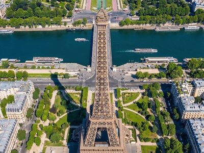 eiffel tower, paris, france, aerial view, seine river, champ de mars, trocadéro, cityscape, landmark, architecture, urban, tourism, travel, iron structure, park, gardens, bridges, summer, blue sky, panorama, ai generated