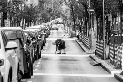 urban, black and white, elderly woman, road, puddle, rainy weather, traffic sign, car wallpapers, crosswalk, weather, parking, elderly people, busy street, cityscape, car, city center, walking, solitary, street photography, everyday life, city life