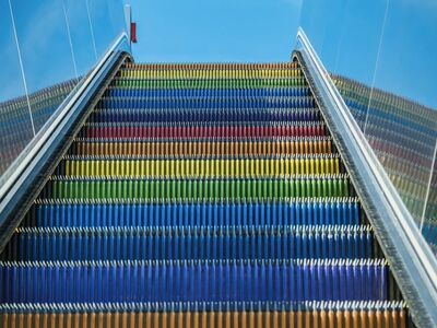 rainbow colors, escalator, urban, modern, architecture, sky, public space, design, colorful, movement, outdoor, transportation, tourism, infrastructure, durability, safety, futurism, travel, technology, artistic