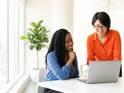 women, professionals, collaboration, teamwork, nature, office, meeting, computer, laptop, smiling, diversity, happy, modern, workplace, learning, discussion, communication, business, technology, indoor, plant