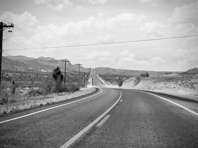 road, desert, highway, black and white, nature, road marking, telephone pole, sky, mountains, landscape, asphalt, desert landscape, travel, uninhabited, weekend getaway, deserted, expedition, adventure, solitude, panoramic view