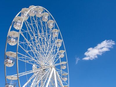 ferris wheel, blue sky, summer, carousel, fun, sky, ride, amusement park, wheel, height, white, celebration, city view, clear day, outdoor activities, history, kitsch, nature, jubilee, holiday, economy, travel, clarity