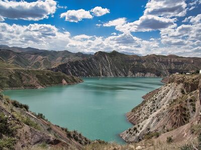 reservoir, lake, natural beauty, blue sky, clouds, mountains, terrain, nature, coastline, greenery, tourist attraction, rock formations, travel, panorama, hiking, peaceful, landscape, view, holiday, bodies of water