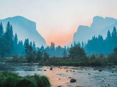 sunset, landscape, mountains, forest, nature, golden hour, scenic view, peaceful, evening sky, sun rays, travel, wilderness, river, valley, tourist destination, nature reserve, camping, light effects, dawn, morning