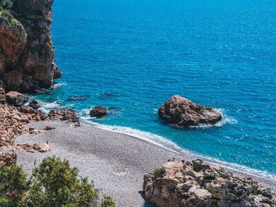 beach, cliffs, blue, stones, nature, sea, mediterranean, landscape, travel, vacation, summer, sunny, tourist, rocky, relaxation, pebbles, beach vacation, antalya, waves, beauty