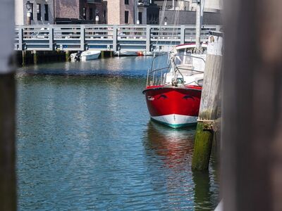 motorboat, red, harbor, sea, yacht, water, sailboat, bridge, cityscape, boat harbor, architecture, boom, mooring, sunny, outdoor, urban area, navigation, summer day, small vessel, relaxation, pier