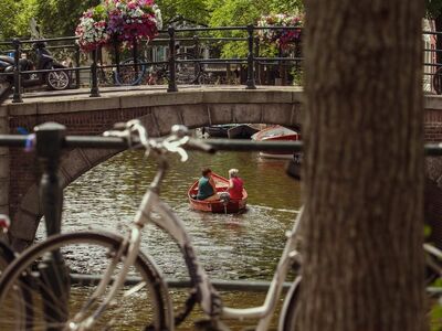 city, canal, architecture, nature, netherlands, water, channel, amsterdam, tourism, river, travel, buildings, europe, boats, holland, houses, historic bridge, bicycle, flower bouquet, lifestyle, picturesque