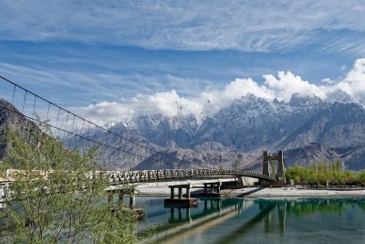 suspension bridge, river, mountains, karakoram, snowy peaks, sky, clouds, khaplu, gilgit-baltistan, natural landscape, bridge, trees, reflection, elements, nature, shyok, bridge construction, tourism, autumn, blue sky
