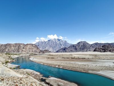 river, mountains, valley, desert, clouds, blue sky, purple mountain, rocky terrain, geology, indian subcontinent, gilgit-baltistan, karakorum, pakistan, current, tibetan plateau, dry riverbed, ecosystem, bend, hiking, riverbed