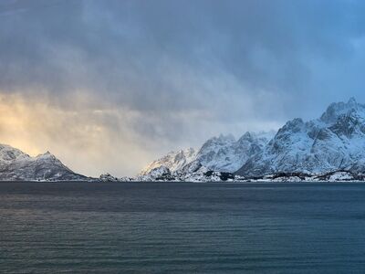 mountains, fjord, winter, snow, nature, water, landscape, winter scene, frozen landscape, nordic fjords, sunset, winter landscape, dramatic sky, rainy, sea, stormy sky, natural beauty, cold, nordic nature, harsh landscape
