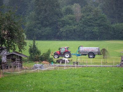 tractor, manure tank, nature, field, agriculture, rain, grass, fence, tractor driver, rural, farm, mountains, green, dairy cattle, wet, cloudy, eco-friendly, spreading, village, land management