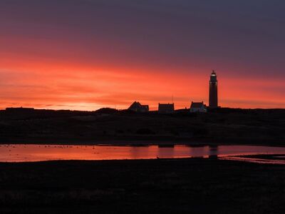 sunset, lighthouse, texel, holland, sea, landscape, setting sun, black clouds, western european landscape, calm water, building silhouette, evening landscape, soft light, silhouette, landscape silhouette, silence, western part, coast, street light
