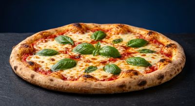 pizza, margherita, mozzarella, fresh basil, tomato sauce, golden crust, plate, slate surface, blue background, studio shot, delicious, gourmet, traditional, cheesy, appetizing, crusty, baked, tasty