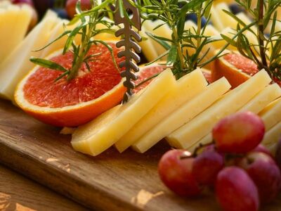 cheese plate, grapes, grapefruit, rosemary, wooden board, tray, cheese, tasty, antipasti, appetizers, herbs, snack, gouda, food, gourmet, slices of cheese, wine festival, fresh ingredients, gourmet catering, table hospitality