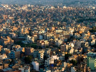 kathmandu, nepal, swayambhunath, urban landscape, sunrise, kathmandu valley, city view, morning light, cityscape, south asia, nature, travel photography, aerial view, dense buildings, capital city, summer season, himalaya foothills, settlement, city panorama
