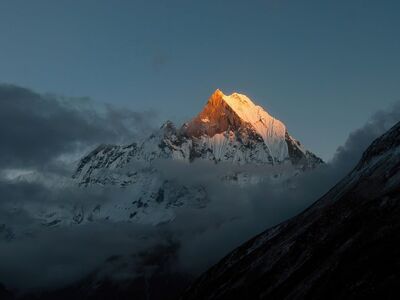 machhapuchhre, fishtail, annapurna base camp, nepal, himalayas, sunset, mountain peak, snow mountain, landscape, nature, trekking, travel, alpine, golden hour, scenery, wilderness, high altitude, steep mountain, clouds, mountaineering, natural beauty