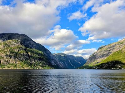 fjord, norway, mountains, water, sky, clouds, landscape, sun, nature, calm, serenity, majestic, tourism, natural beauty, summer day, coastal landscape, peace, view, panoramic, blue sky, Norway, Vestland, Eidfjord