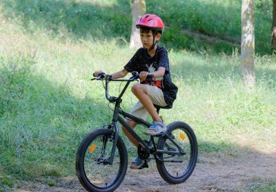 child, helmet, biking, bike ride, boy, bicycle, pathway, nature, park, sports, recreation, trees