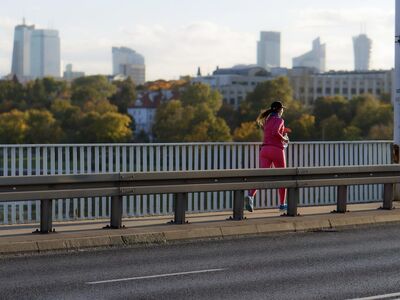 girl, running, jogging, exercise, bridge, sidewalk, cityscape, building, trees, sports, health, nature, lifestyle, urban, autumn