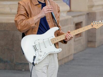 boy, casual, playing, guitar, electric, talent, public place, urban, building, musical, entertainment, attraction, tourism, lifestyle