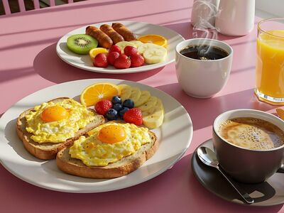 breakfast, toast, eggs, fruit, sausages, juice, coffee, table, pink, plate, food, orange, banana, strawberry, blueberry, kiwi, mug, cup, knife, spoon, napkin, drink, meal, healthy, coffee cup, delicious
